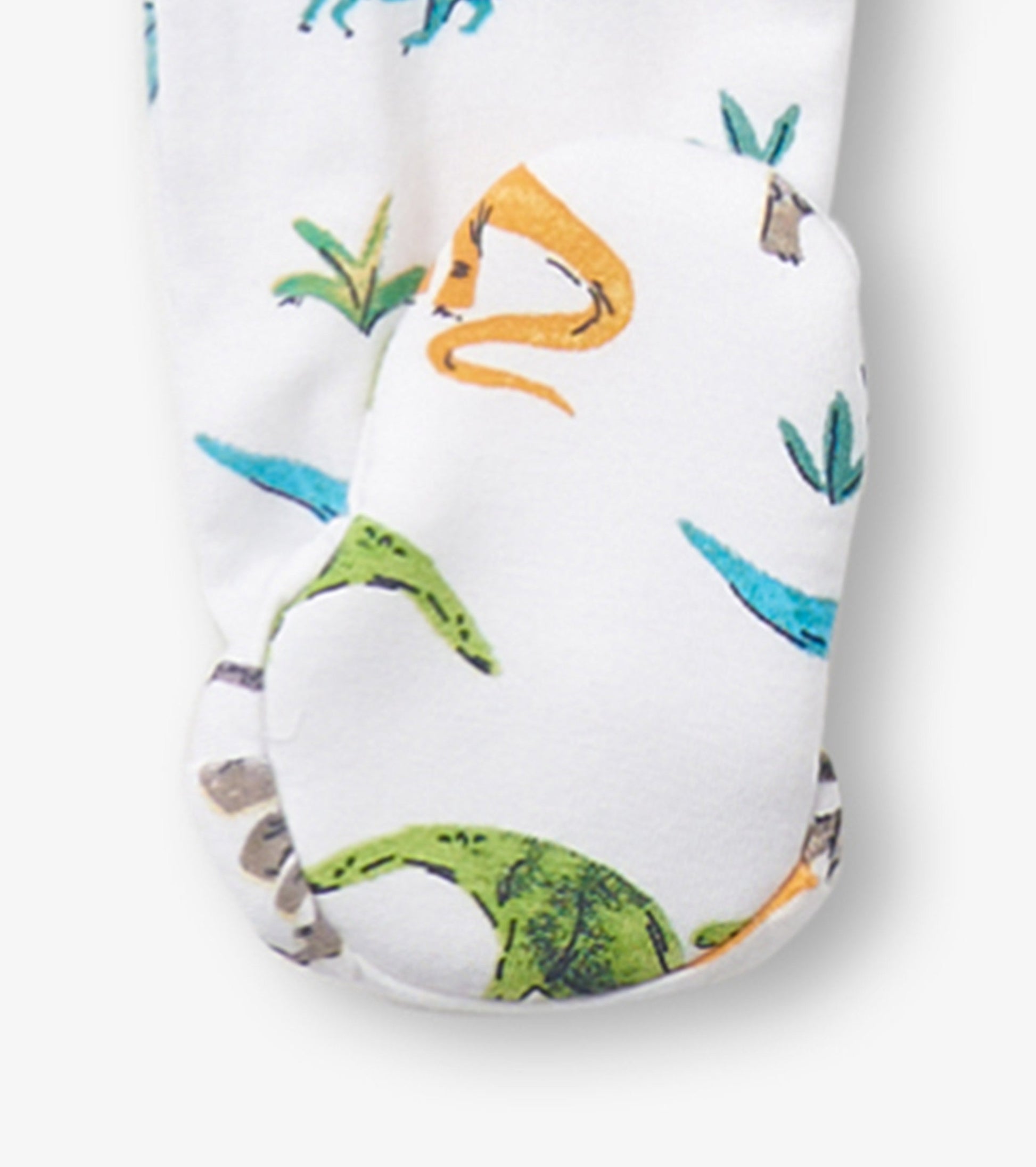 White footed sleeper featuring colorful dinosaur prints and soft fabric, designed for baby boys.