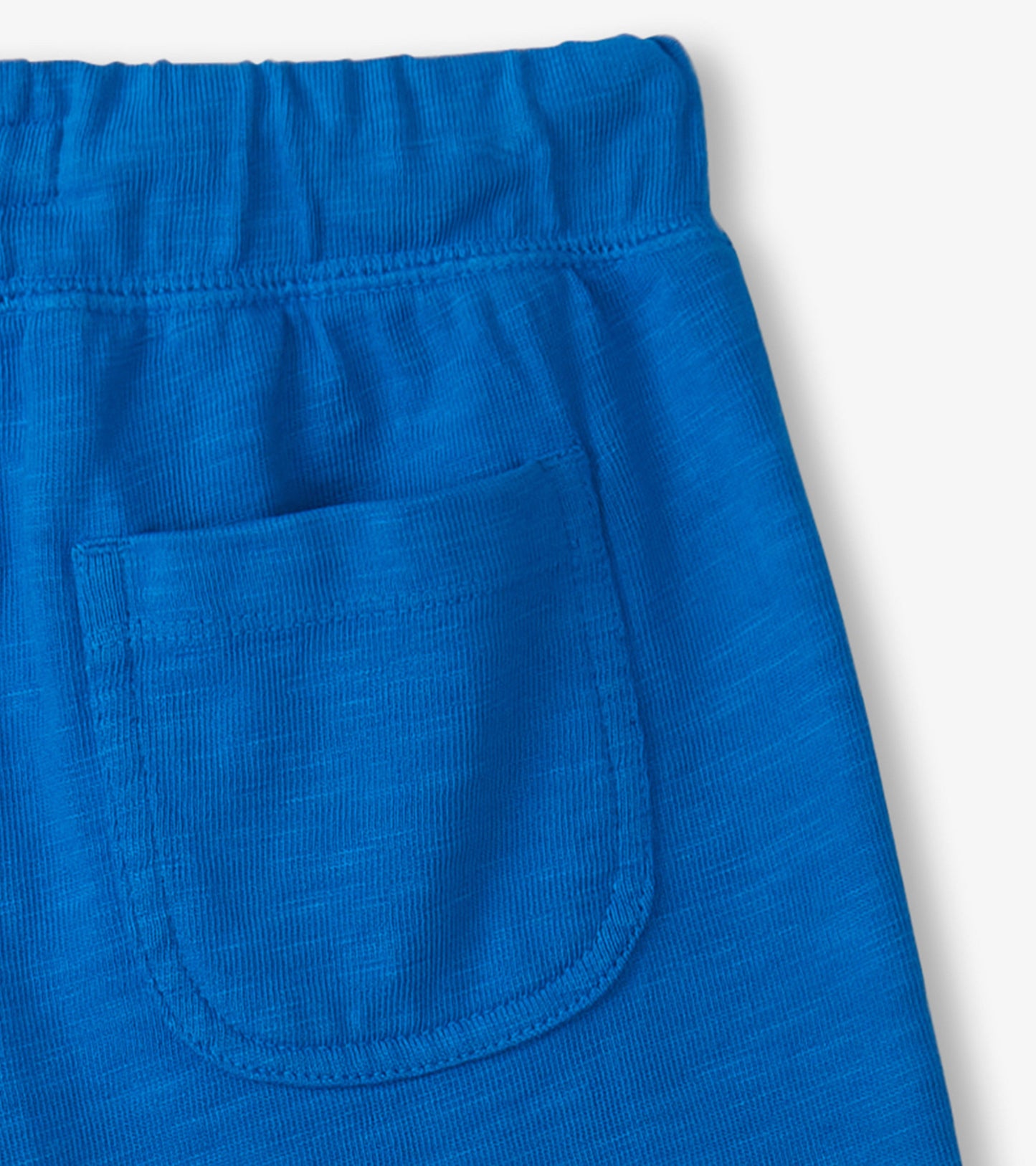 Deep blue relaxed shorts featuring an elastic waistband and a back pocket, made from soft, breathable fabric.