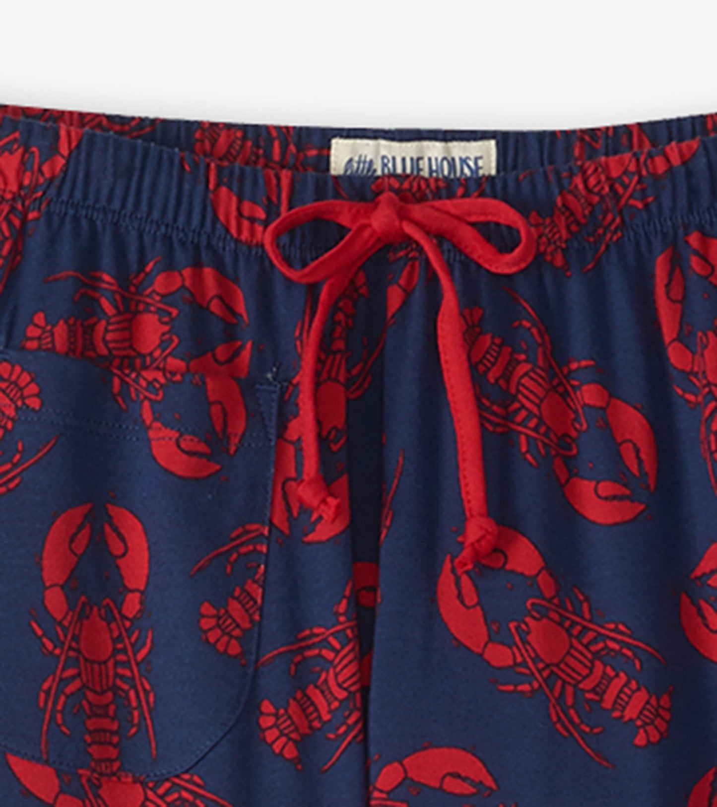 Navy cotton pajama pants featuring a red lobster print and an elastic waistband with a drawstring.