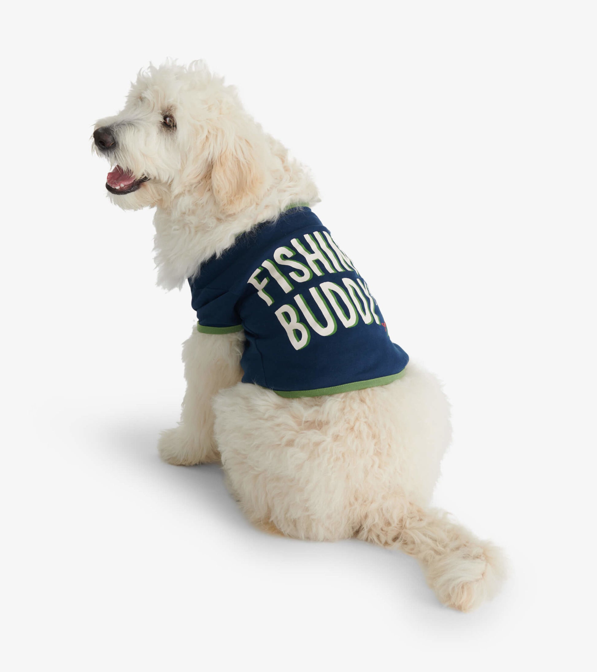 Navy dog tee with "FISHING BUDDY" text, featuring green trim, worn by a fluffy white dog sitting sideways.