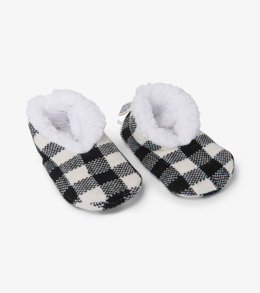 Cream plaid kids' slippers with a cozy white faux fur lining, designed for warmth and comfort.