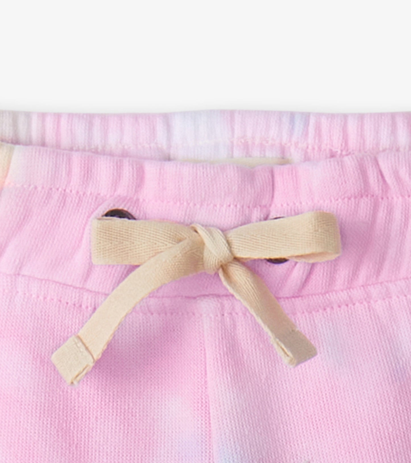 Light pink pull-on shorts with a drawstring waistband, perfect for summer wear.