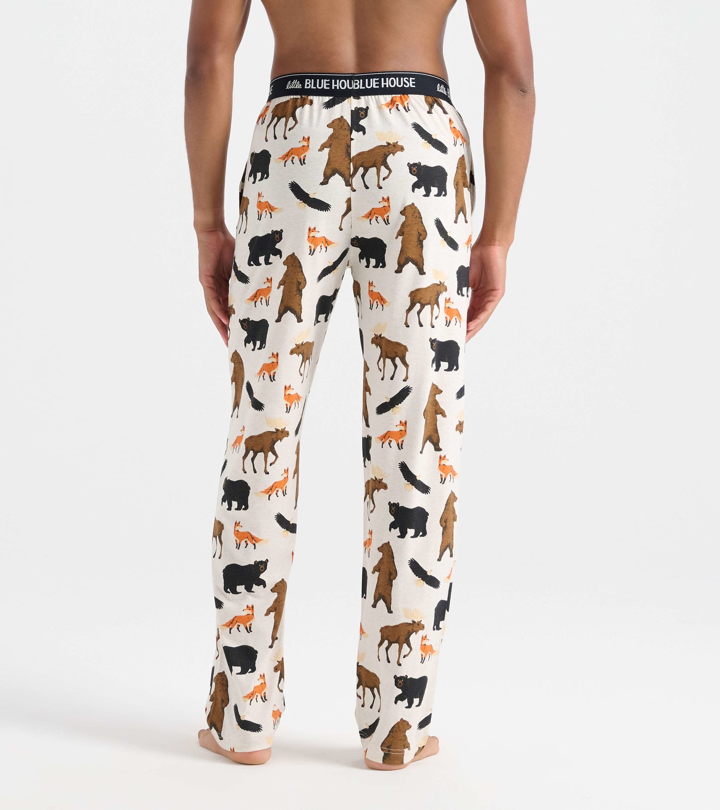 Men's cotton blend pajama pants featuring a wildlife pattern with bears, foxes, and moose on a cream background.