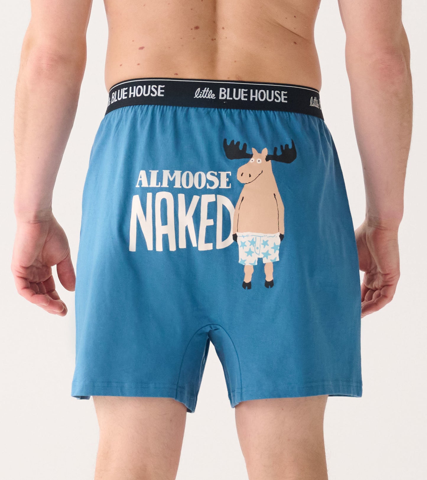 Blue cotton boxer shorts featuring a humorous moose graphic and the word "NAKED" on the back.