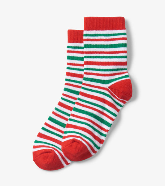 Red crew socks with green and white candy cane stripes, suitable for kids aged 2-7.