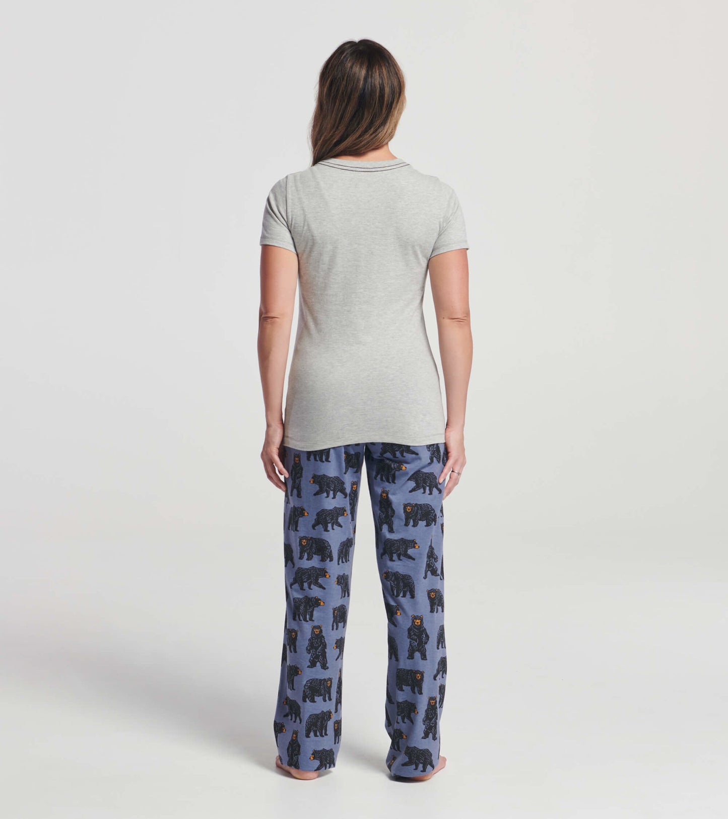 Gray short-sleeve pajama t-shirt paired with blue pants featuring a bear pattern, viewed from the back.
