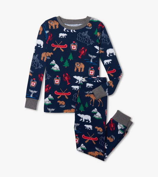 Navy pajama set featuring playful animal and nature patterns, with gray cuffs and a comfortable fit for kids.