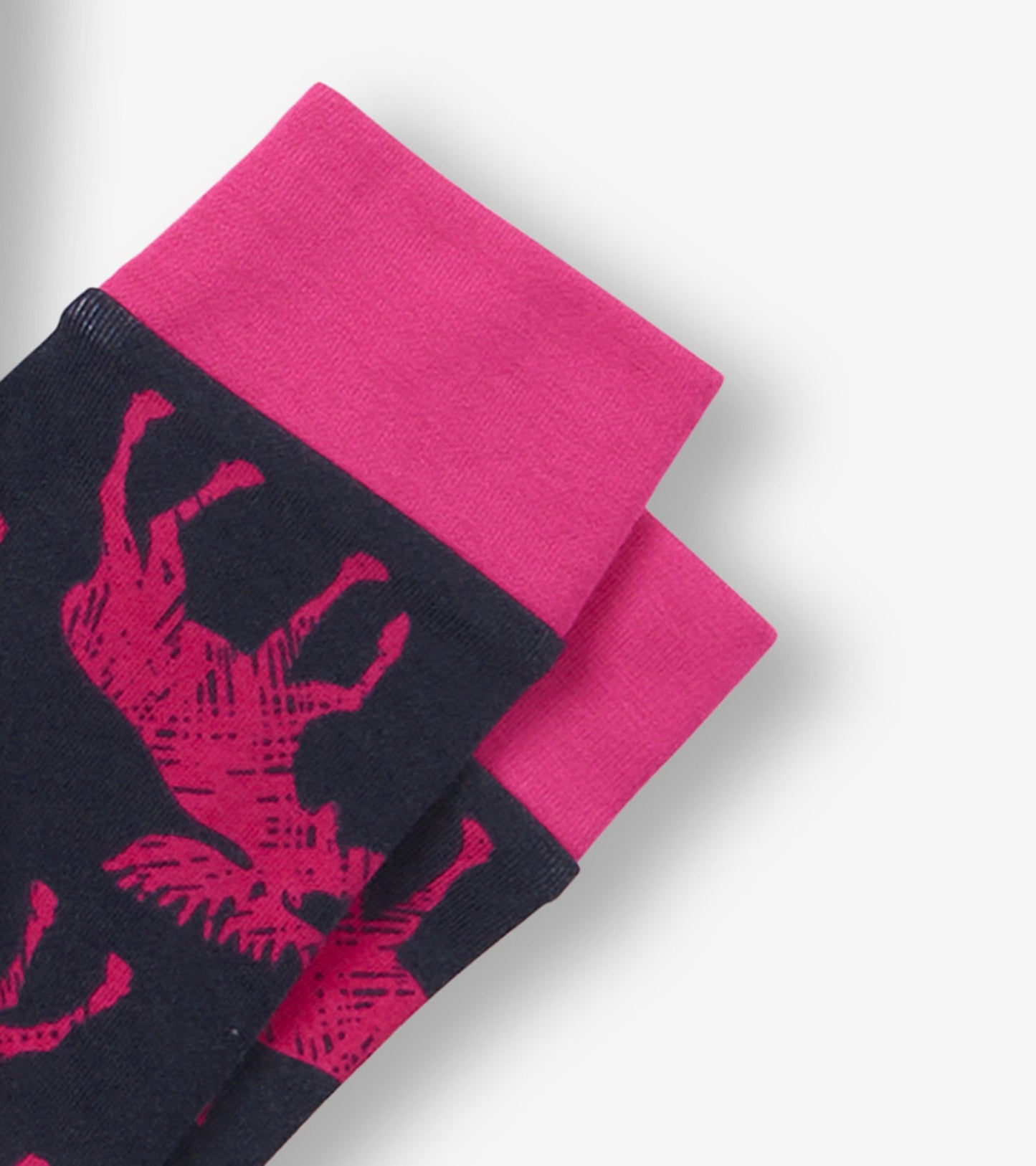 Navy pajama set featuring pink moose print and contrasting pink cuffs, designed for kids.