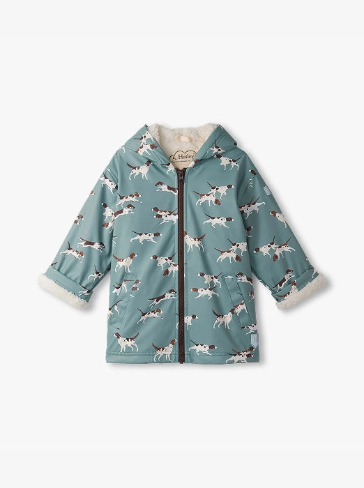Promotes boys' sale outerwear. Showing teal hooded rain jacket with dog print. With "Sale" text.