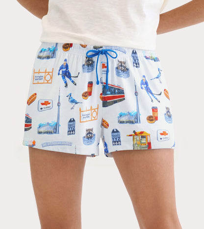 Women's Toronto boxers worn front view, white with blue drawstring and Toronto landmark print