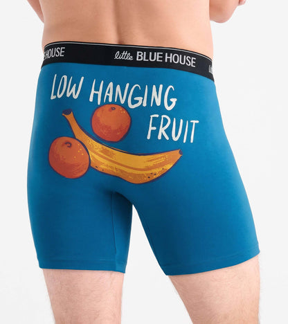 Blue men's boxer briefs with banana and orange print and black logo waistband, front view