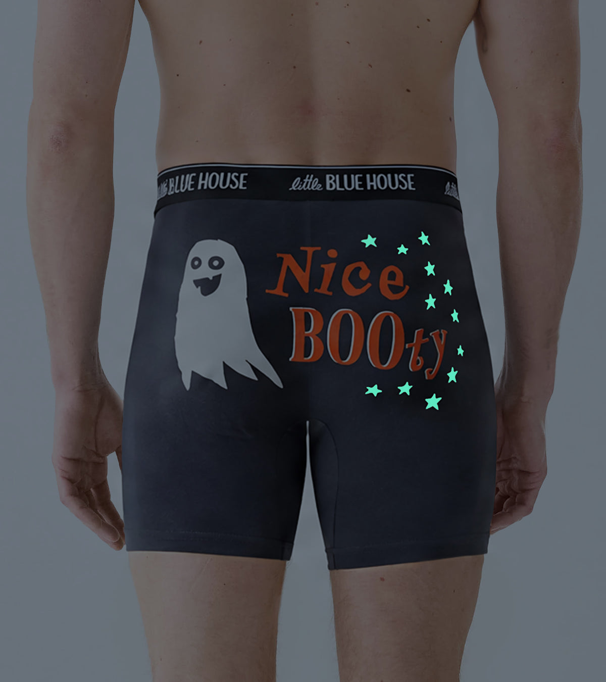 Back view of slate blue boxer briefs with glow-in-the-dark stars around the Nice BOOty graphic