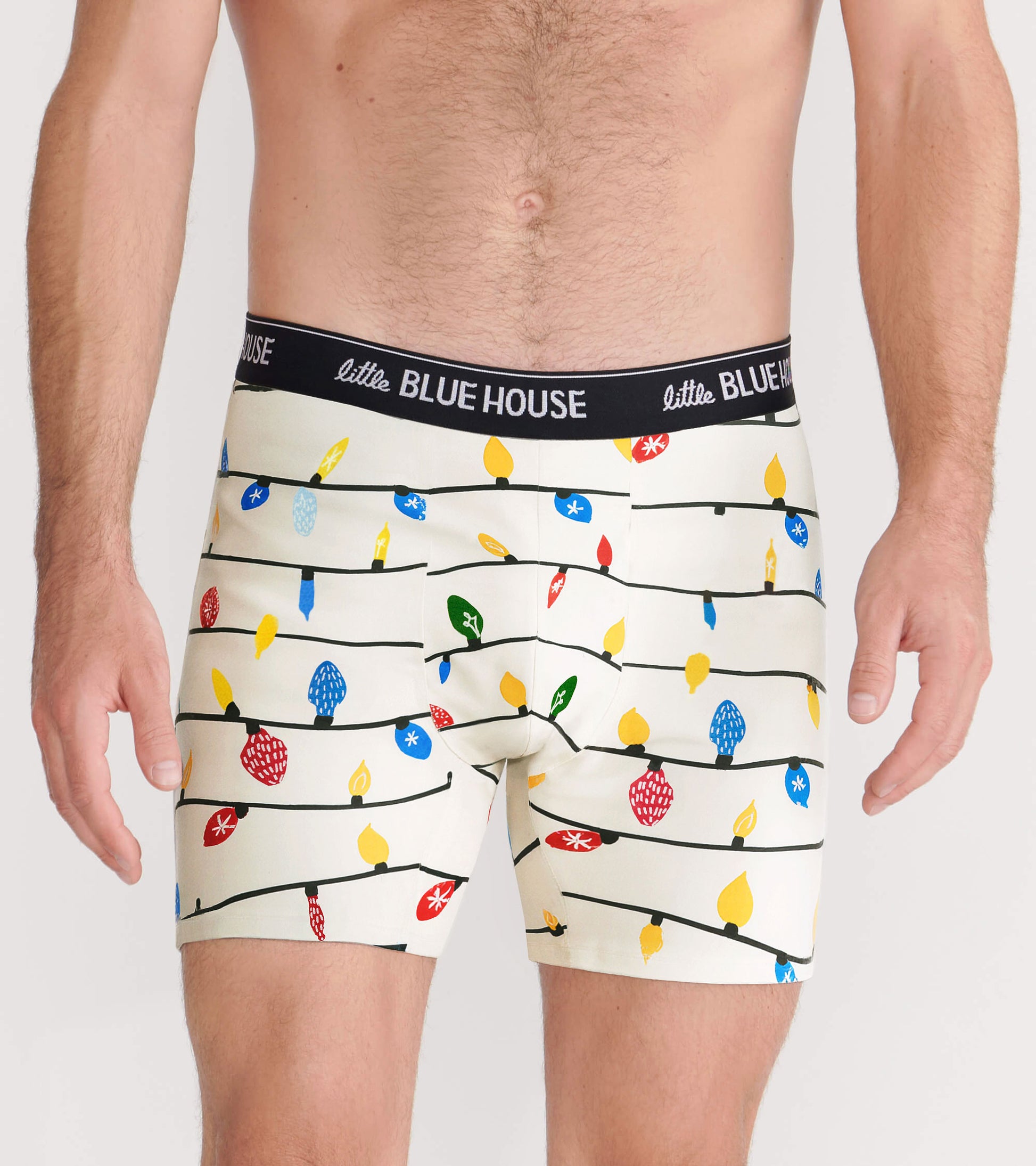 Men's boxer briefs featuring a festive light bulb pattern on a cream background, with a black elastic waistband.