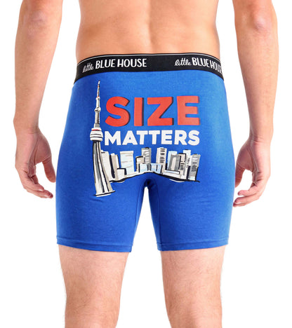 Back view of blue boxer briefs with Toronto skyline, CN Tower and "SIZE MATTERS" graphic