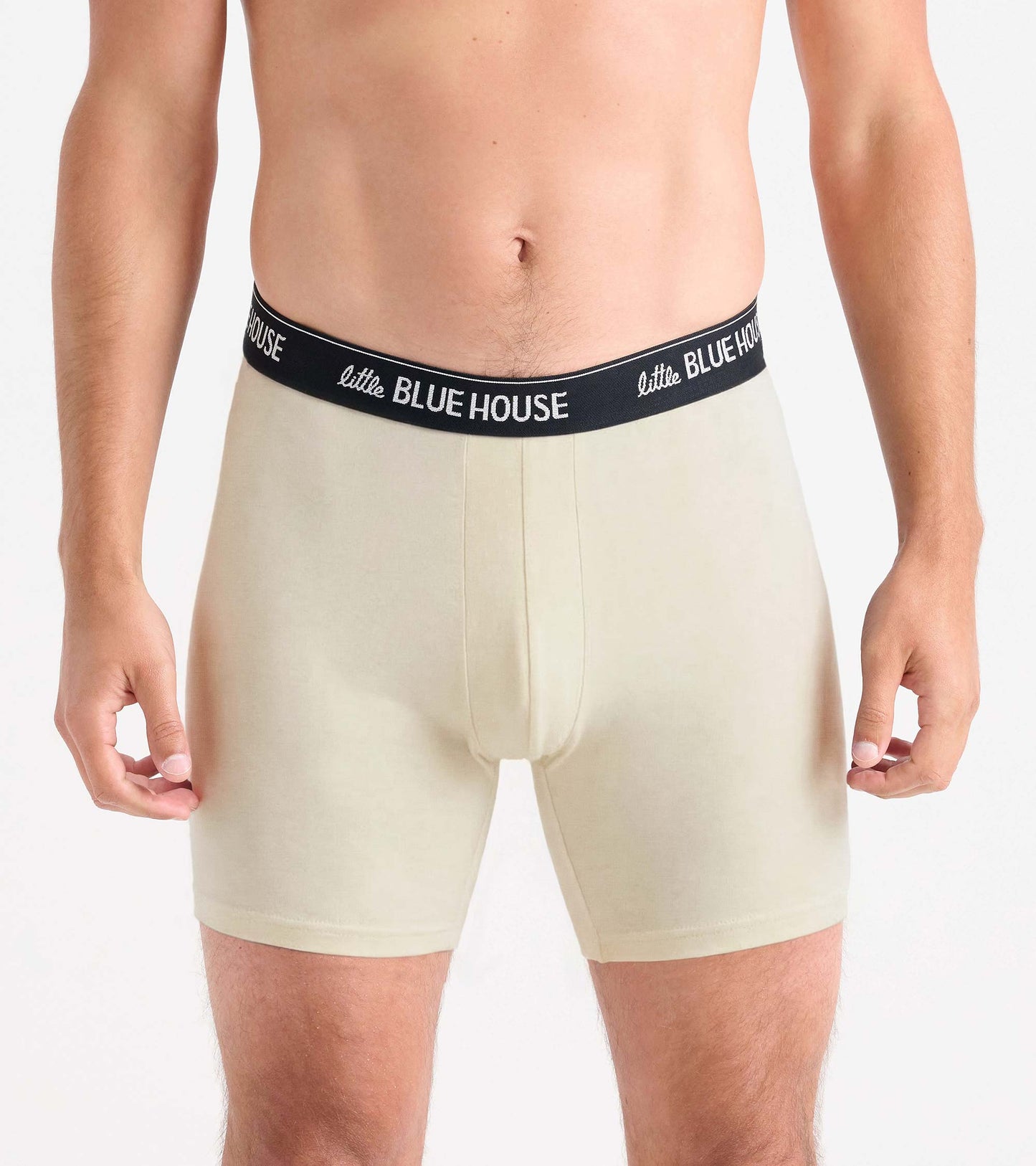 Men's beige boxer briefs with black logo waistband, front view