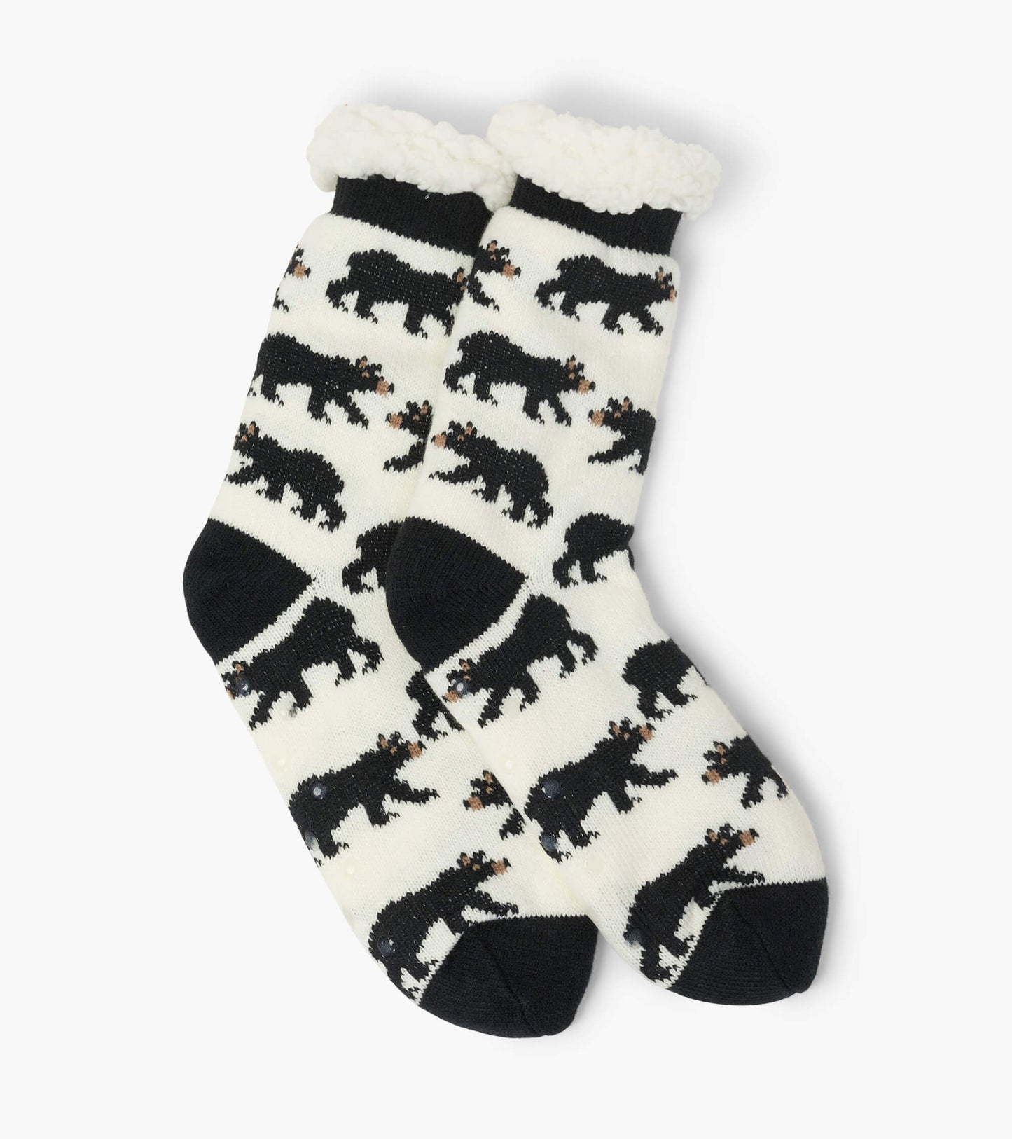 Cream socks with black bear patterns and a fluffy white cuff, designed for warmth and comfort. One size fits most.