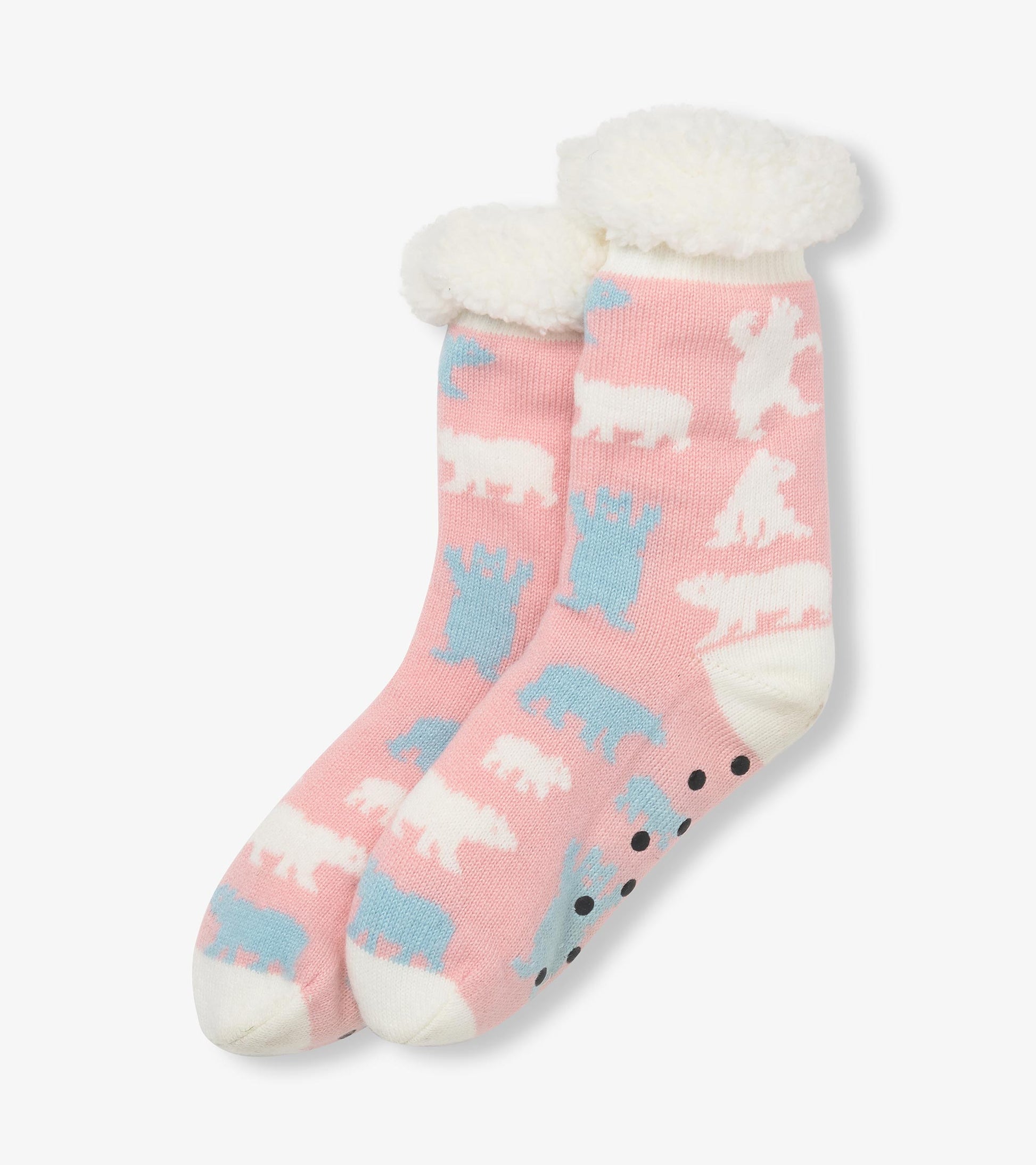 Pink sherpa-lined cabin socks with white polar bear pattern and blue accents, shown folded pair