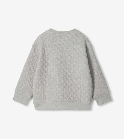Back view of boys athletic grey quilted pullover with long sleeves and ribbed hem