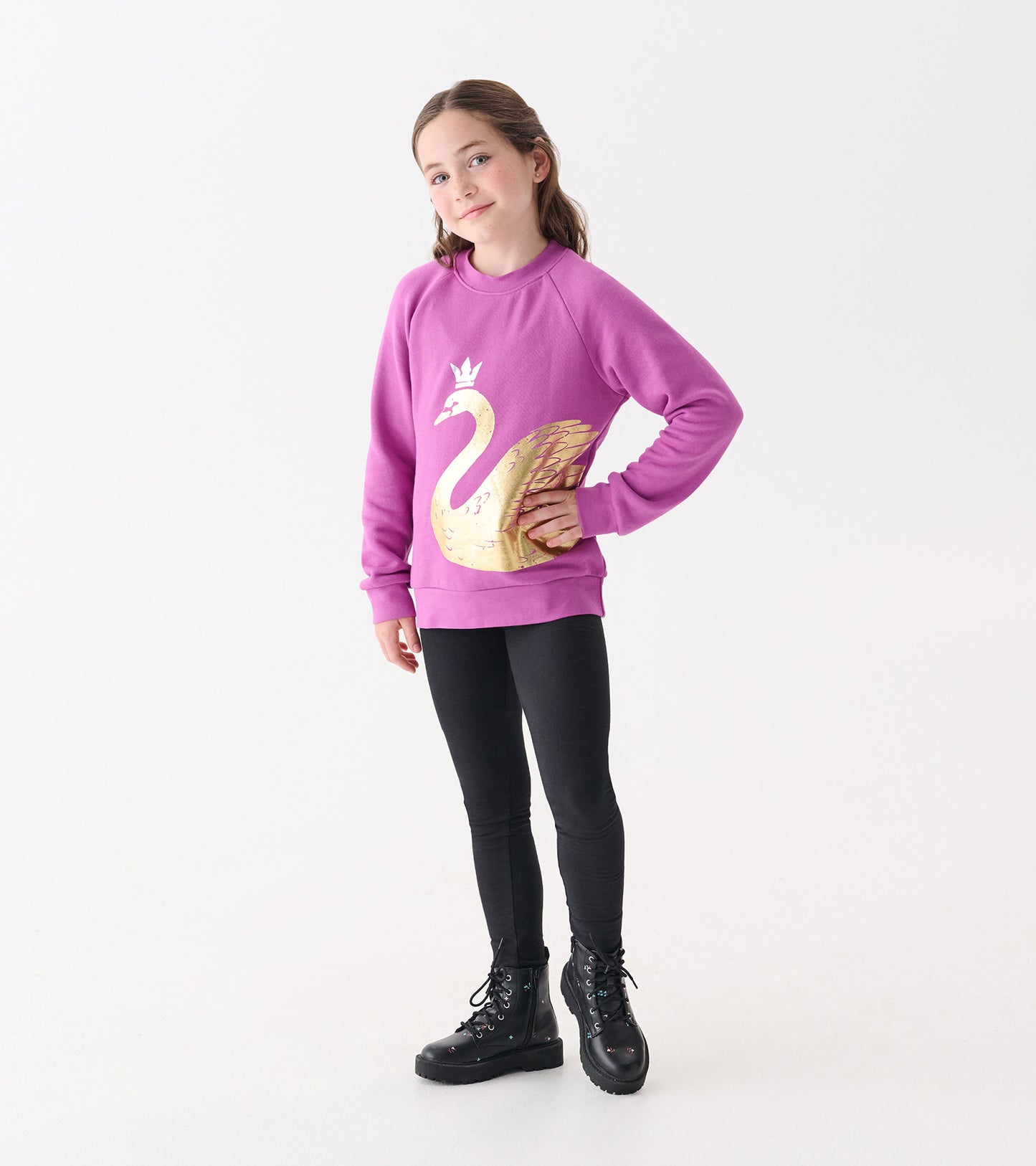 Black cozy leggings for girls, made from soft material, perfect for casual wear or layering.