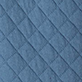 Blue diamond-quilted fabric pattern