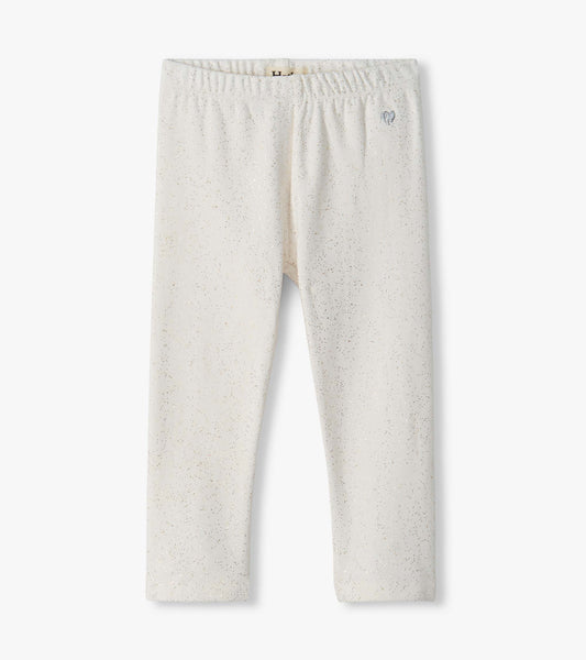 Cream infant leggings with allover silver speckle print and elastic waistband