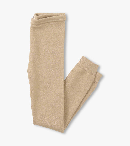 Gold glitter leggings with a soft, stretchy fabric, featuring a fitted design and elastic waistband.