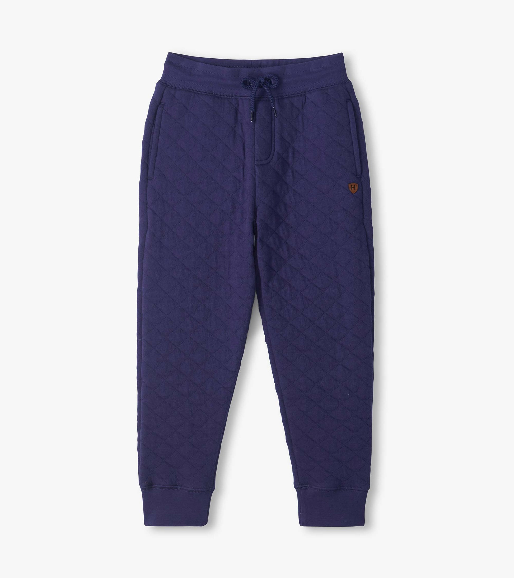 Patriot blue quilted jogger pants with drawstring waist, side pockets, and ribbed ankle cuffs