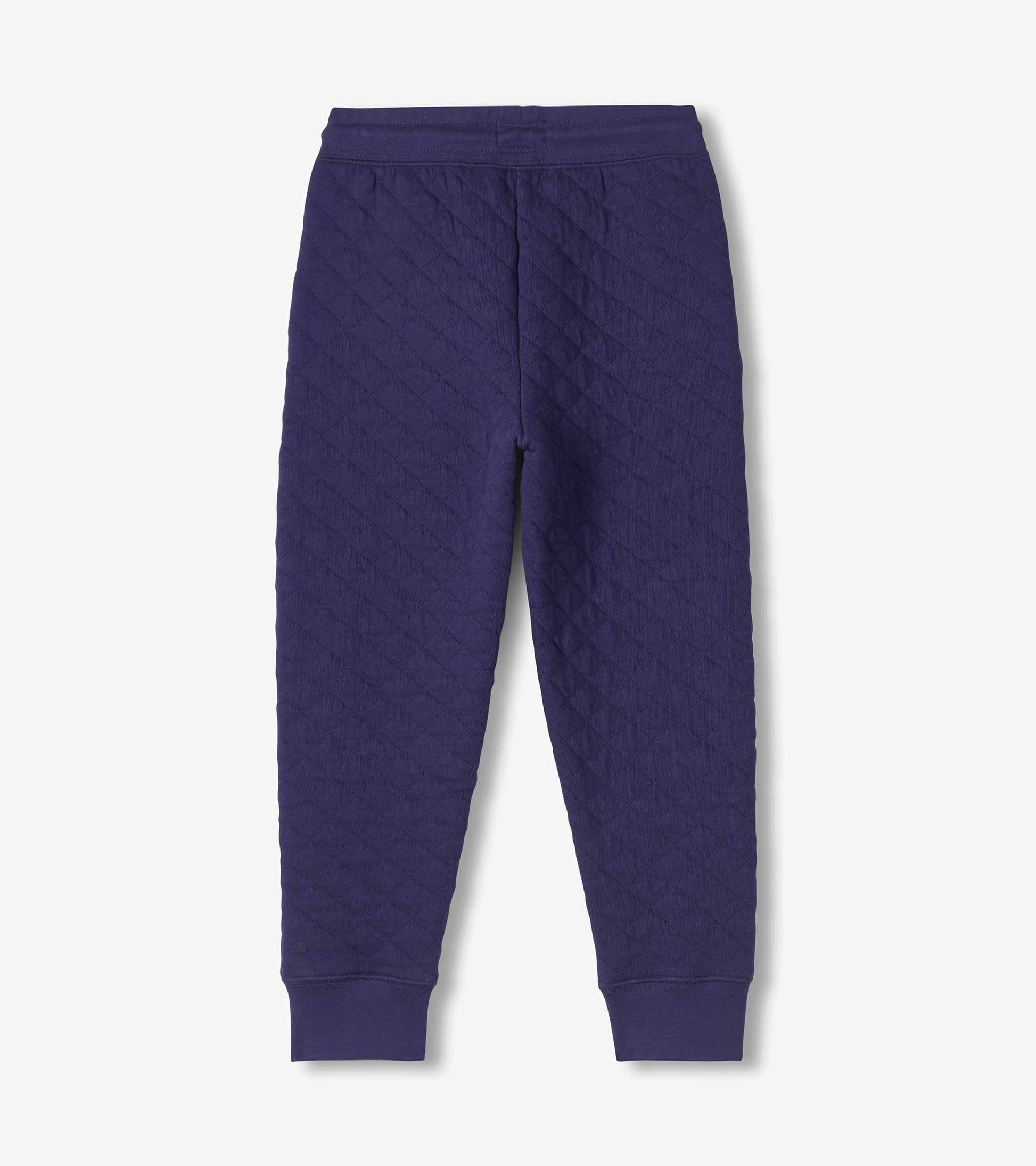 Back view of boys patriot blue quilted joggers with tapered legs and ribbed cuffs