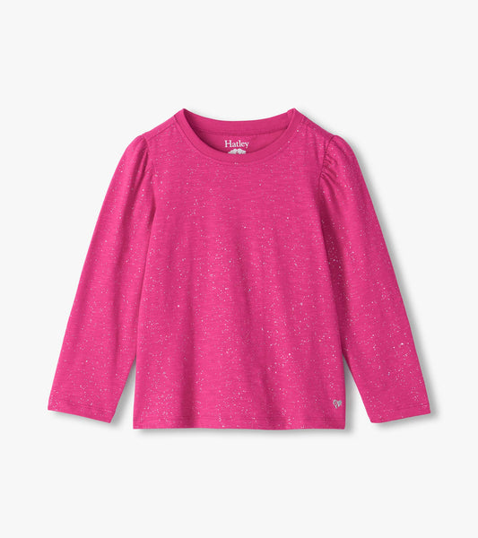 Bright pink long sleeve tee with silver speckles, puff shoulders, and a small heart near the hem