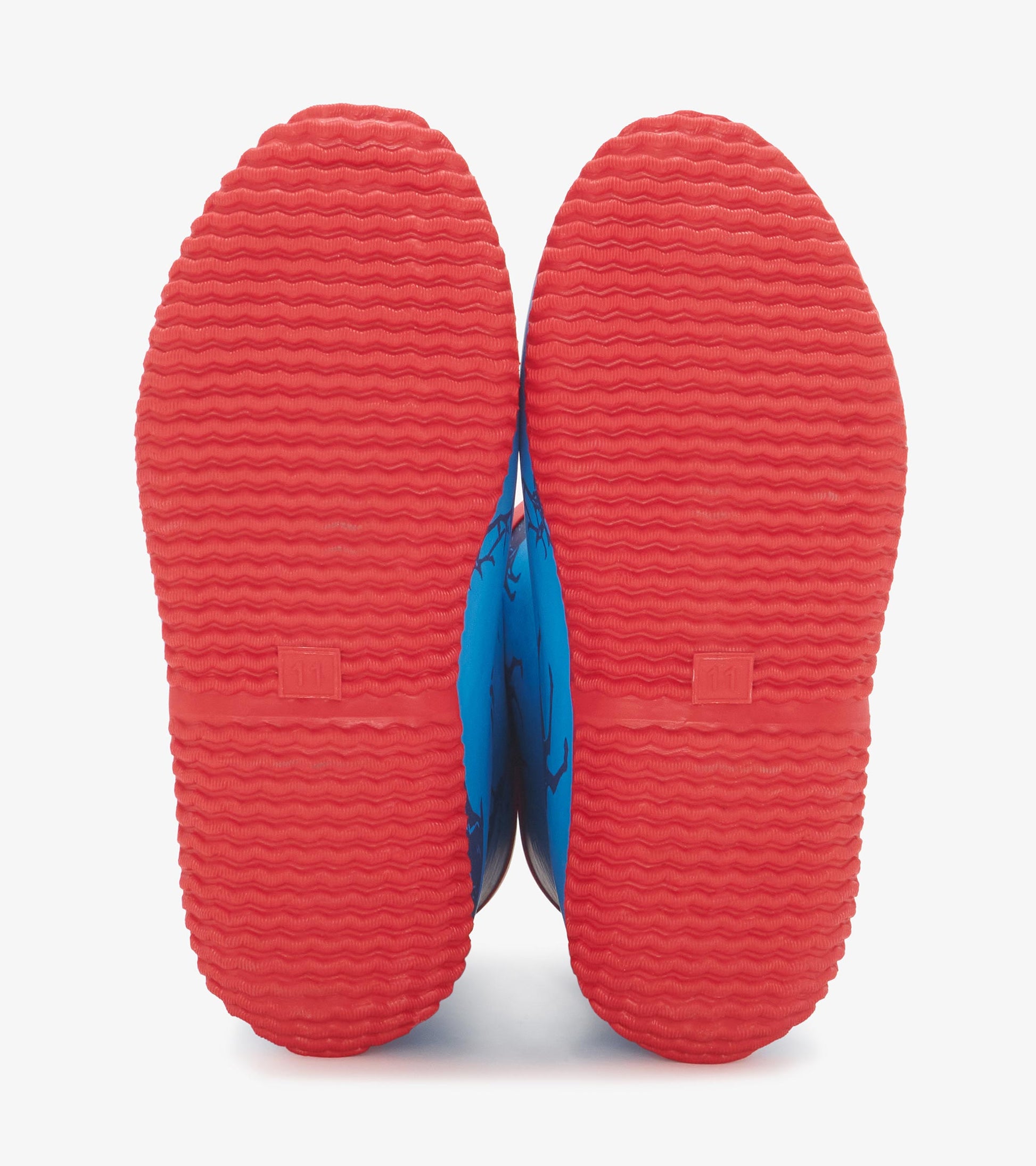 Blue packable rain boots with a textured red sole, designed for boys, featuring a playful pattern.