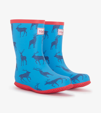 Blue packable rain boots featuring a deer pattern and red trim, designed for kids.
