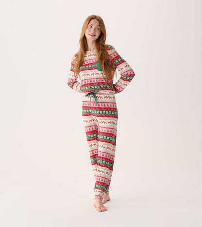 Long-sleeve pajama set in cream with a festive puppy hearts Fairisle pattern in red, green, and pink.