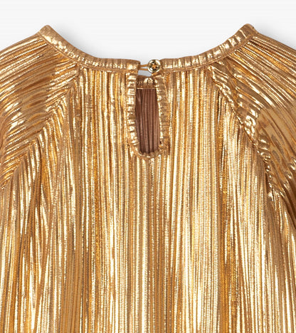 Close-up of gold metallic dress neckline with pleated texture and back keyhole button closure