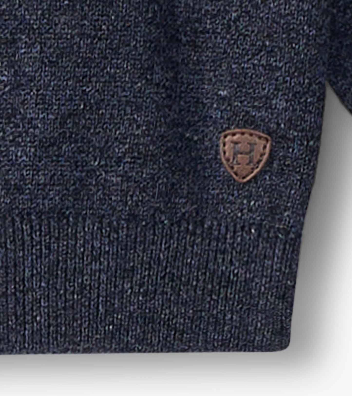 Navy crew neck sweater for baby and toddler boys, featuring a textured knit and a small brown logo patch.