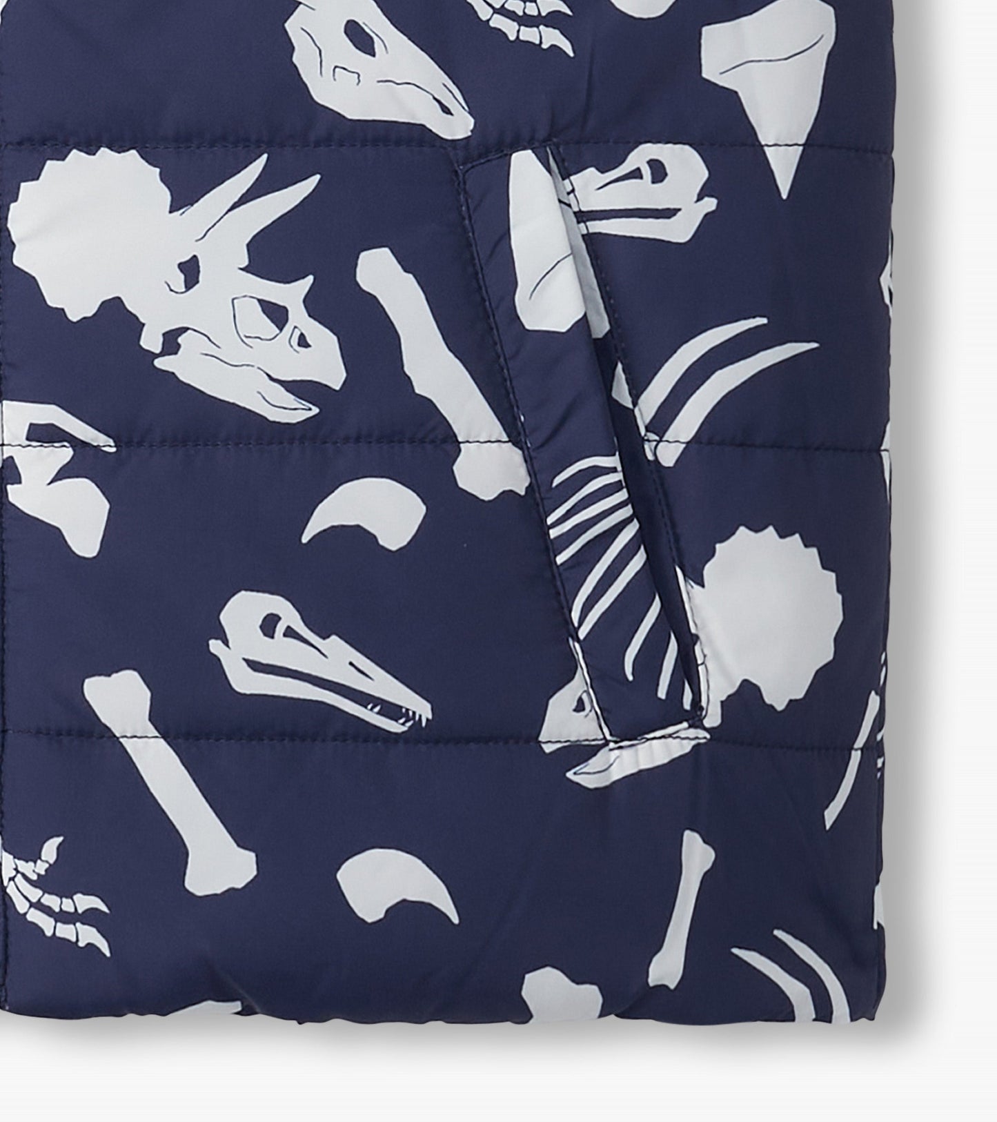 Veste sans manches matelassée réversible – Fossiles de dinosaure