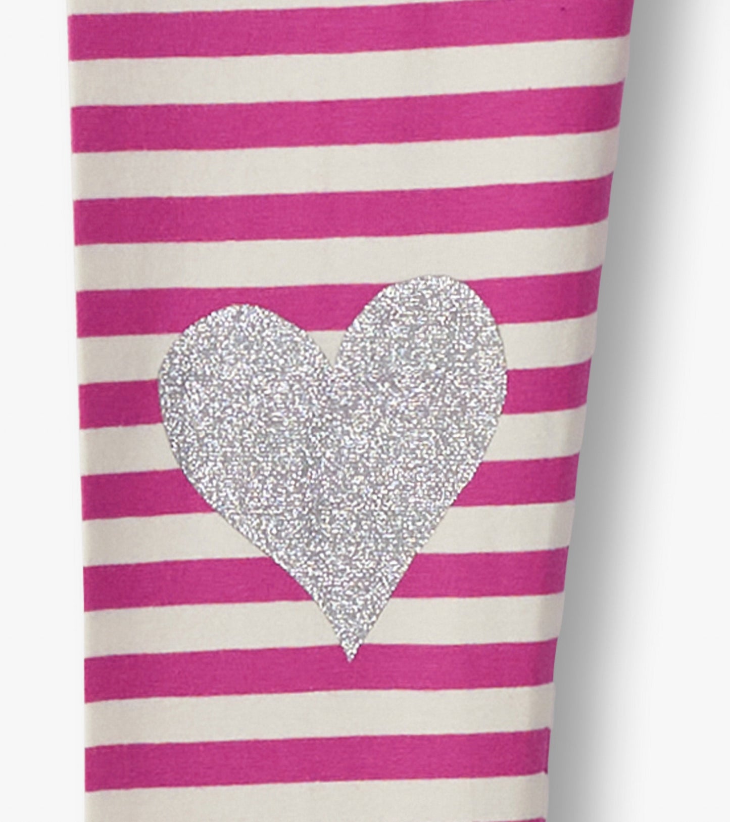 Pink and white striped leggings featuring a large silver glitter heart design.