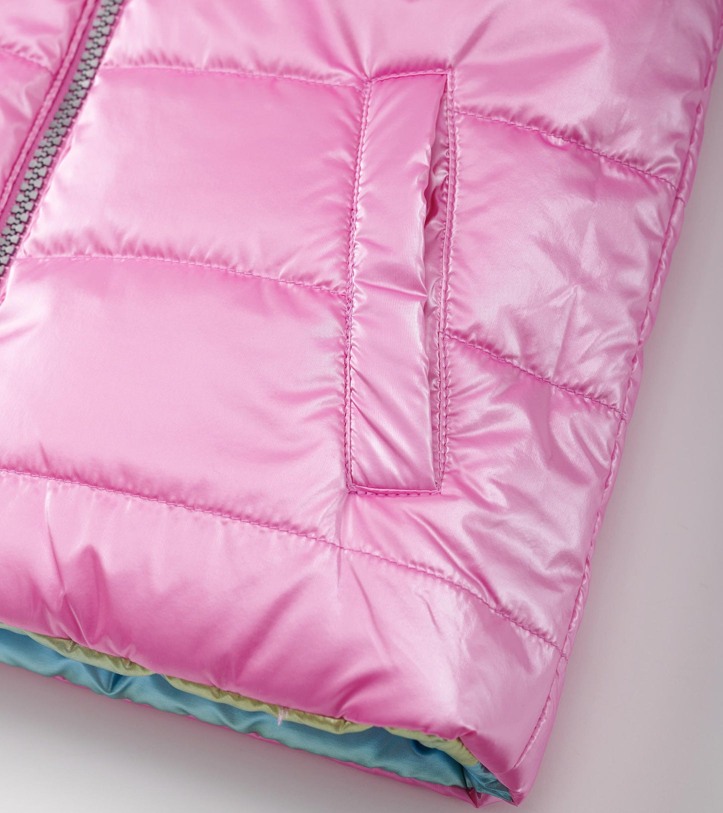 Veste sans manches matelassée réversible – Éclat d’arc-en-ciel