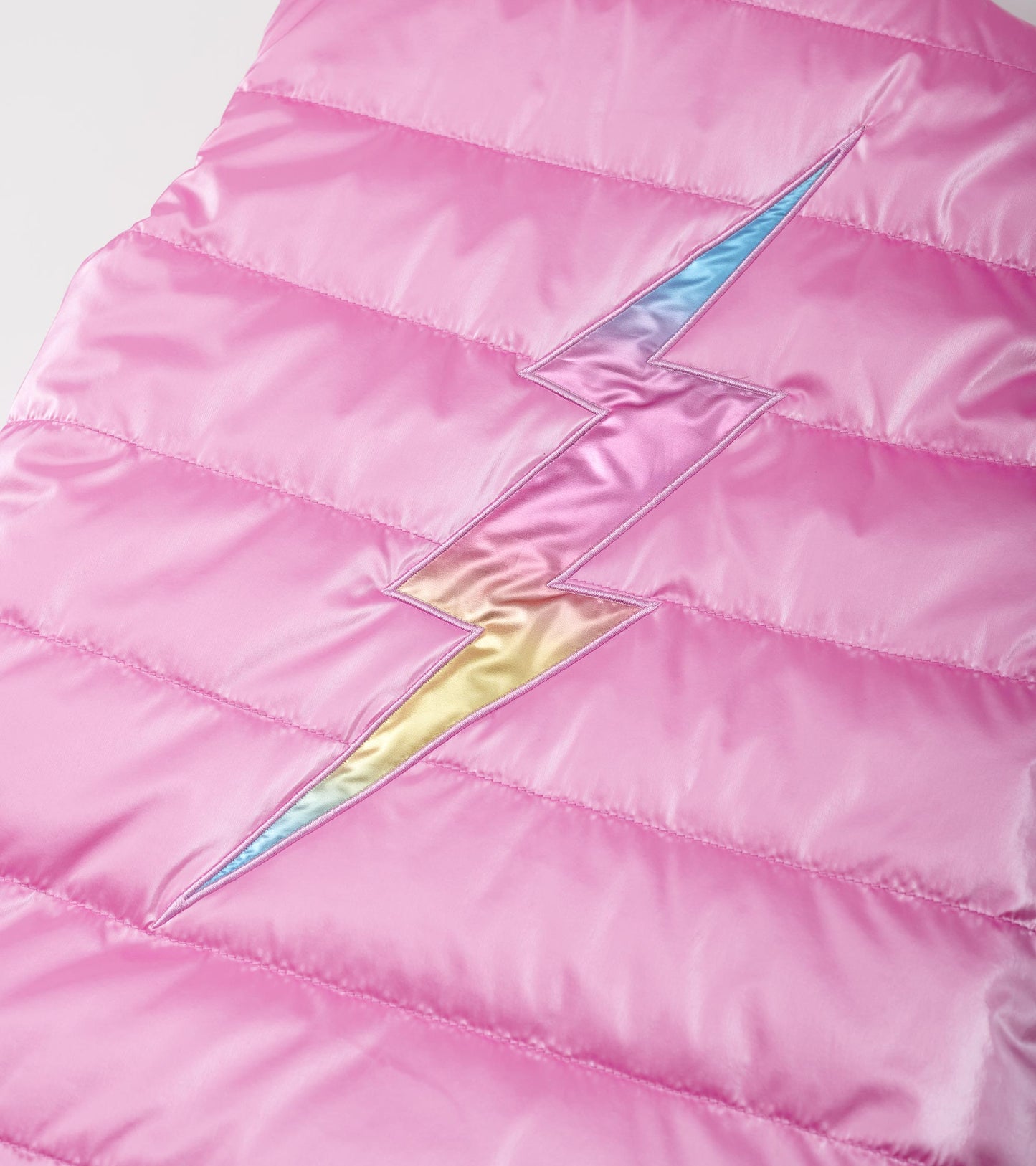 Veste sans manches matelassée réversible – Éclat d’arc-en-ciel