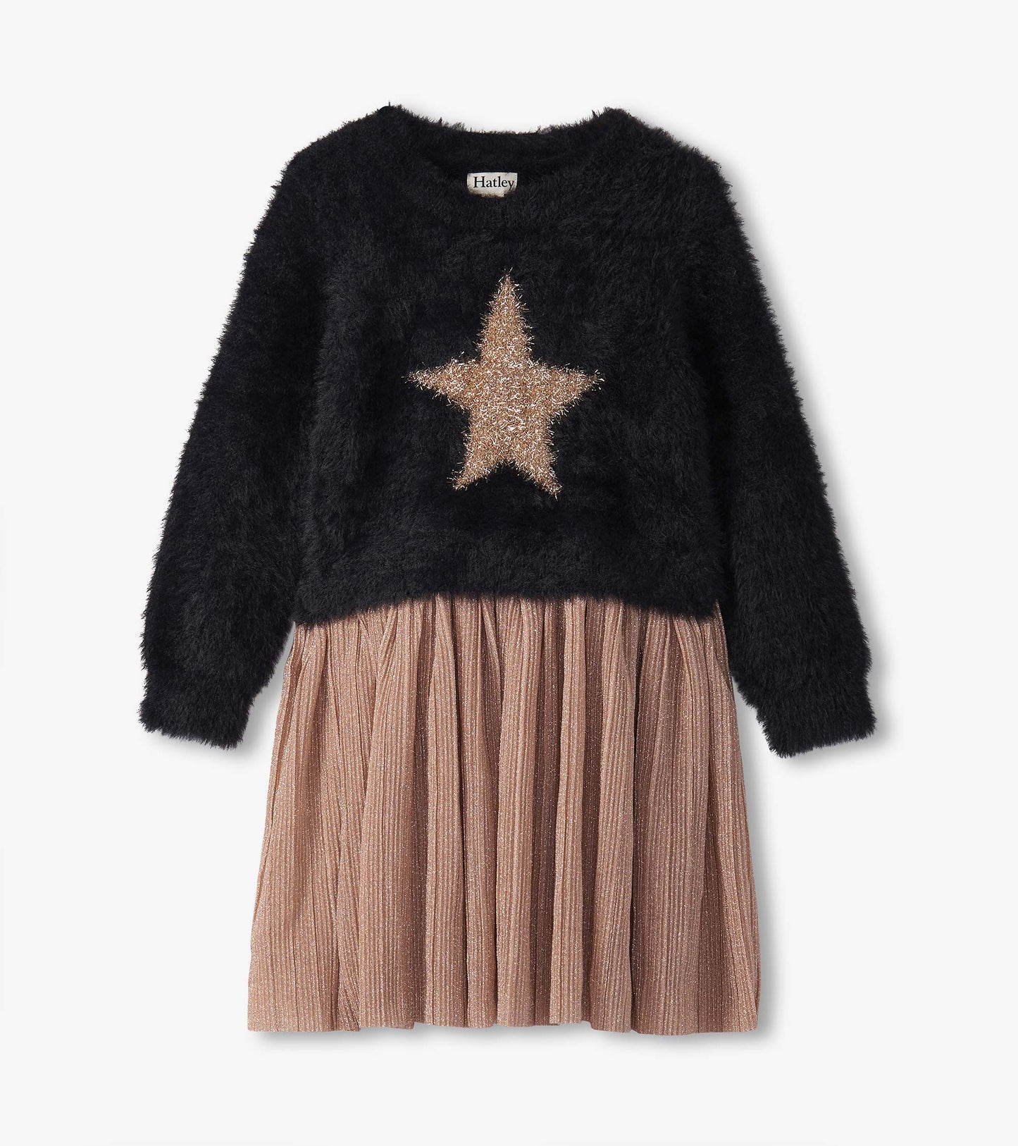 Black fuzzy top with a gold star design, paired with a pleated, shimmery rose gold skirt.