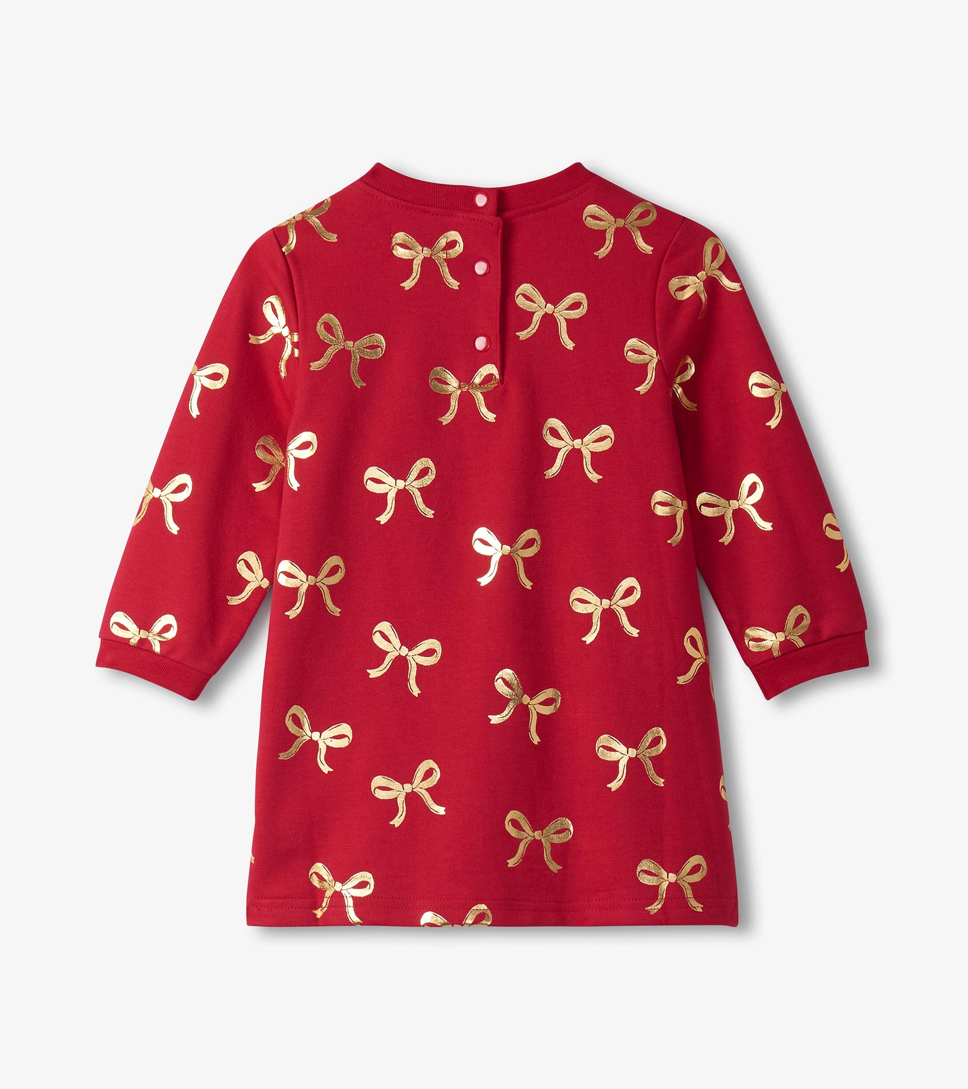 Red dress featuring a pattern of gold ribbons, with long sleeves and a button closure at the back.