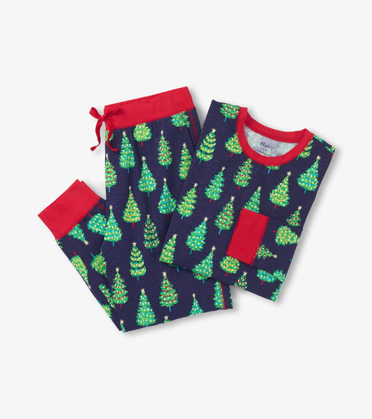 Navy cotton pajama set featuring colorful bottle brush trees, with red accents on the top and pants.