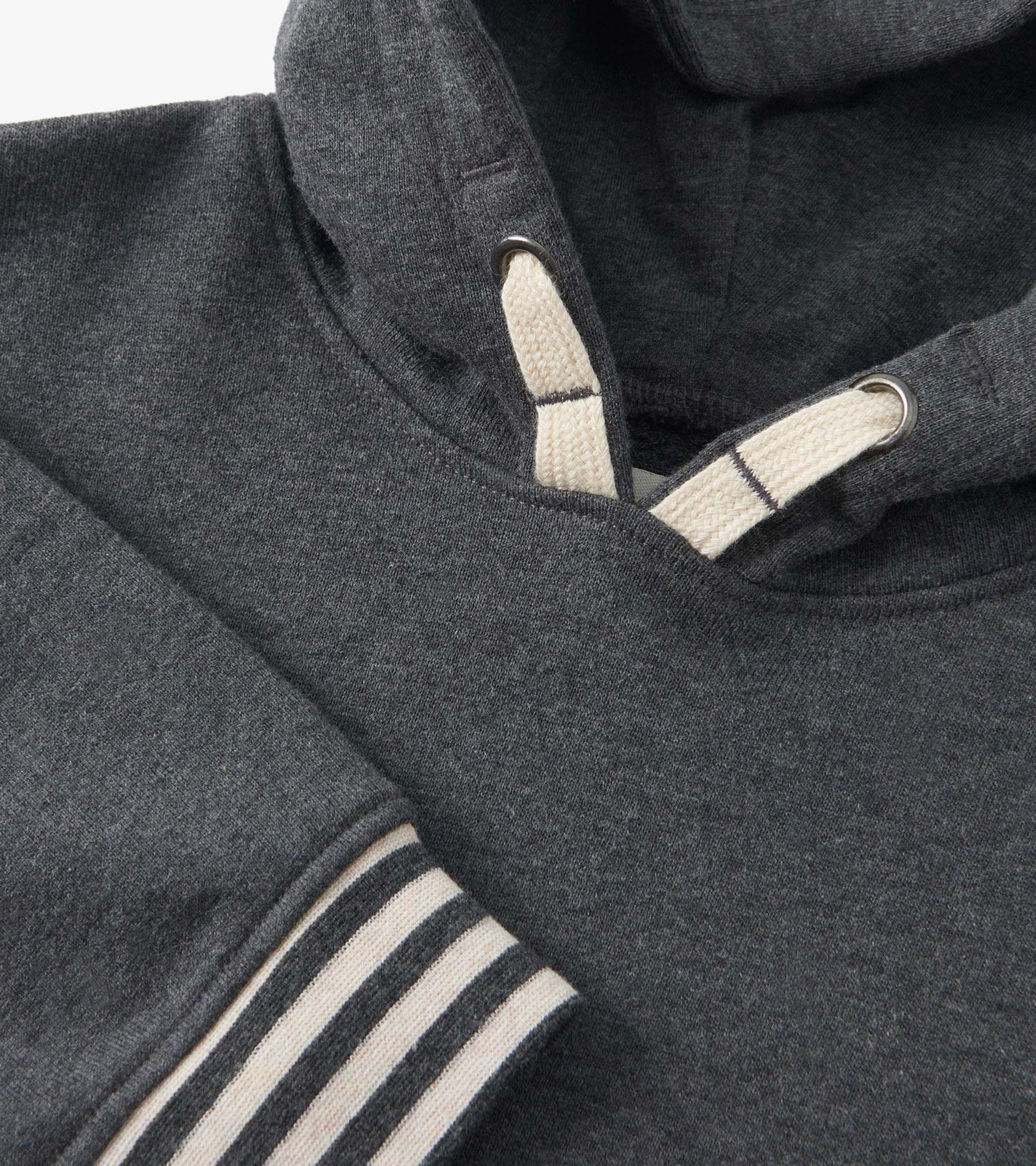 Charcoal melange pullover hoodie with a hood, featuring a striped cuff and contrasting drawstring detail.