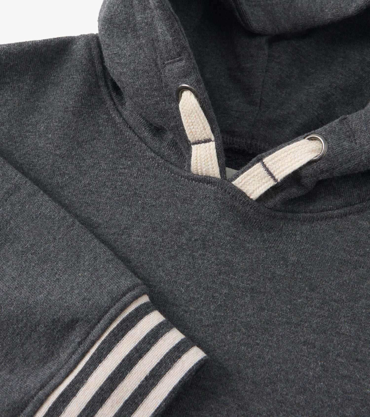 Charcoal melange pullover hoodie with a hood, featuring a striped cuff and contrasting drawstring detail.