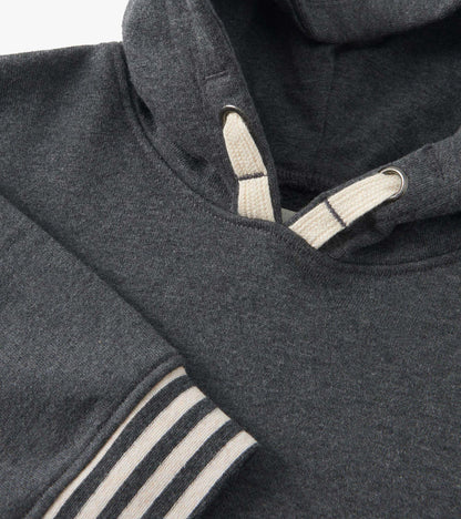 Charcoal melange pullover hoodie with a hood, featuring a striped cuff and contrasting drawstring detail.