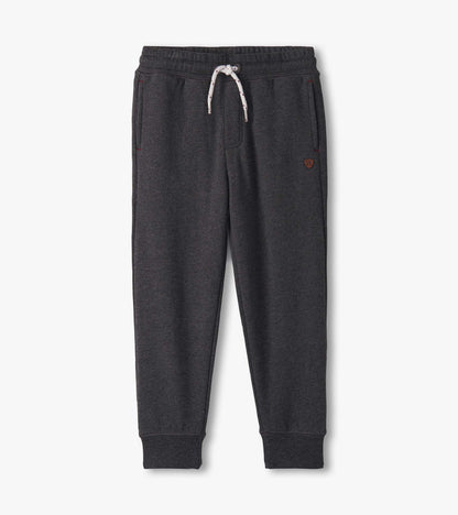 Charcoal melange joggers with an elastic waistband, drawstring, and side pockets. Suitable for casual wear.