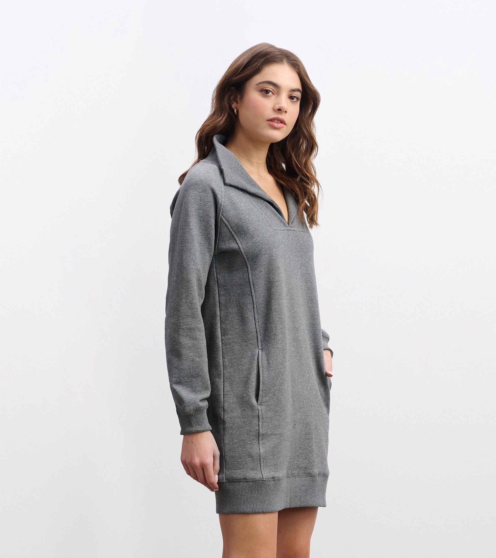 Charcoal melange dress with a notch neck, long sleeves, and side pockets, featuring a relaxed fit.