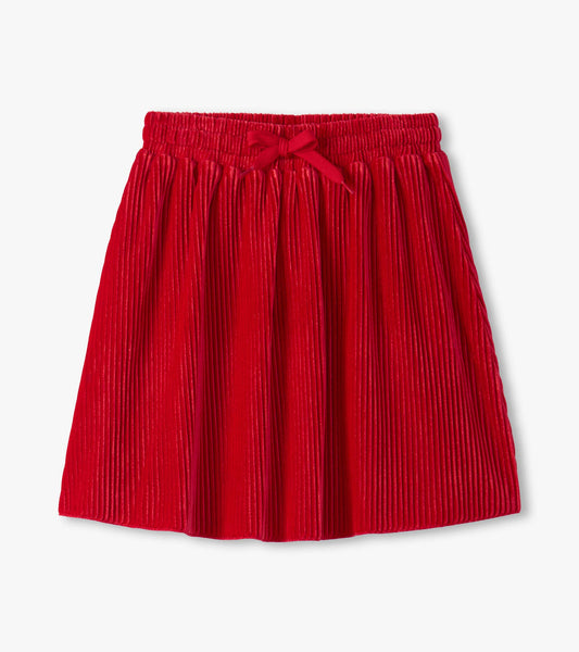 Red pleated velour skirt featuring an elastic waistband and bow detail at the front.