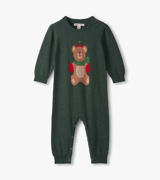 Green knitted romper featuring a teddy bear design, long sleeves, and snap closures at the bottom for easy dressing.