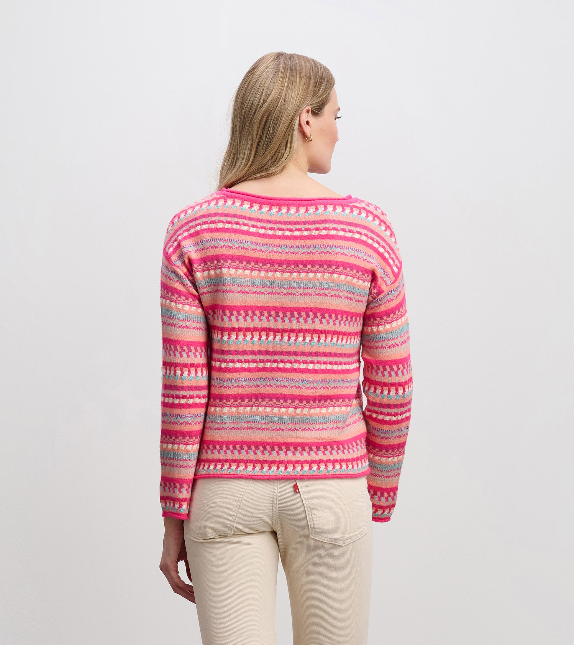 Colorful striped sweater in pink, featuring a round neckline and long sleeves, shown from the back.