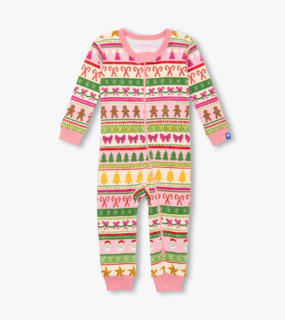 Pink cotton sleeper featuring a fun Fair Isle pattern with gingerbread men, Christmas trees, and festive motifs.